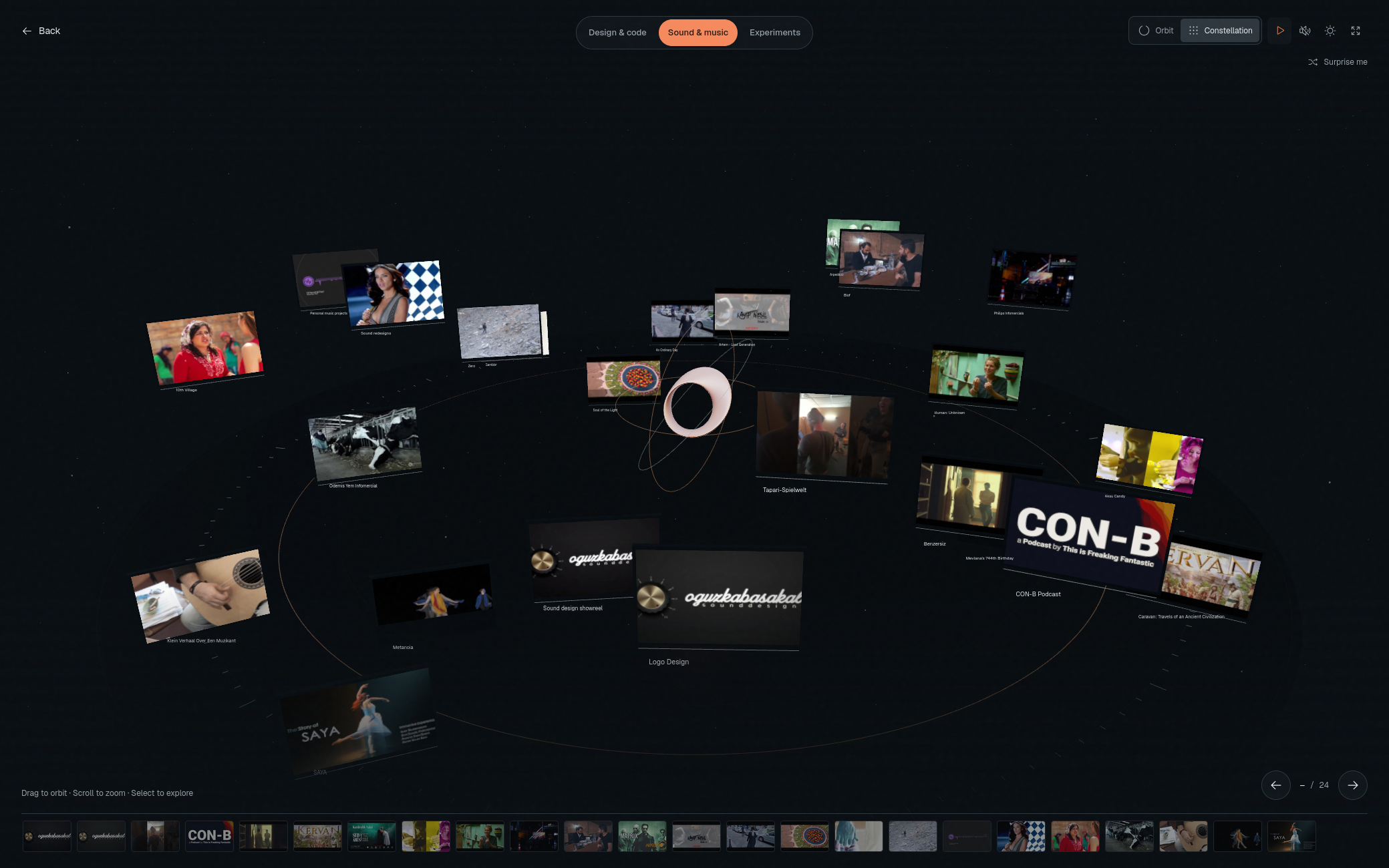 Dark 3D portfolio gallery with project panels arranged around a player